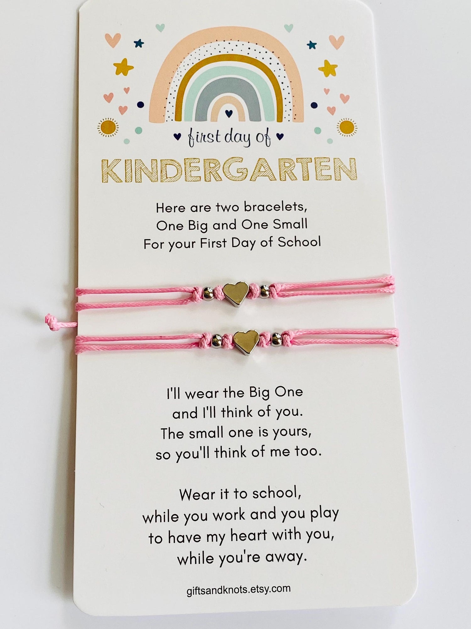 Mommy and Me bracelets with silver heart charms and silver beads. The bracelets are made of 1mm waterproof cord in pink color. Minimalist design.