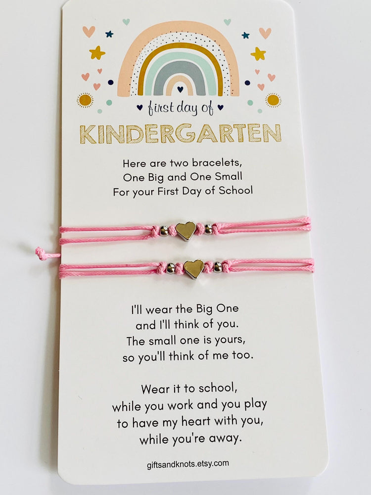 Mommy and Me bracelets with silver heart charms and silver beads. The bracelets are made of 1mm waterproof cord in pink color. Minimalist design.