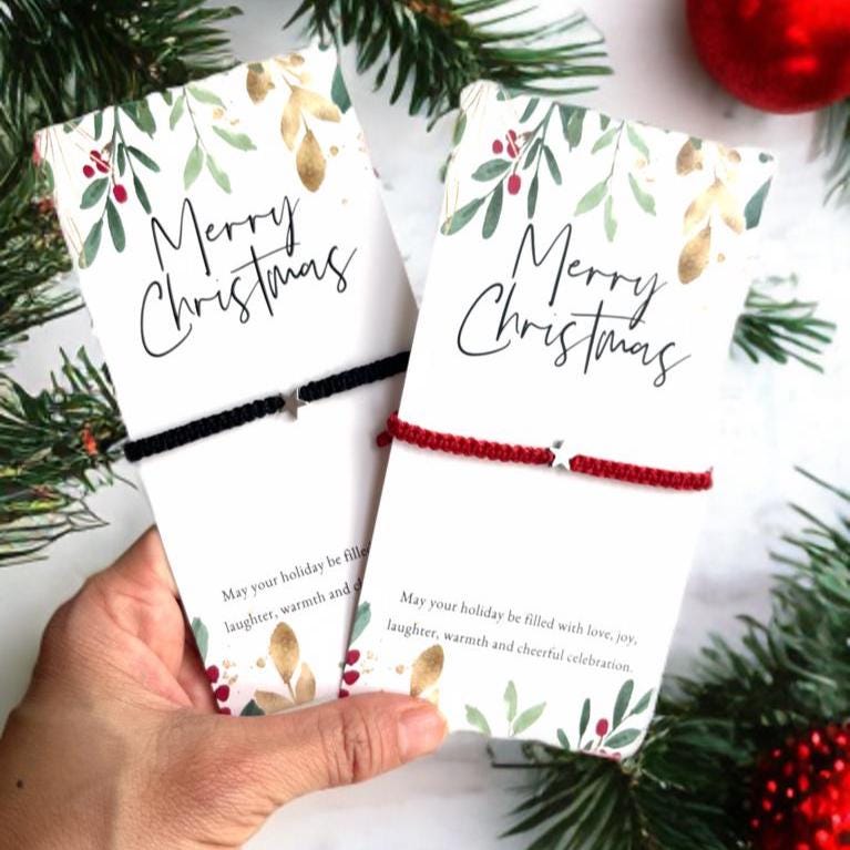 Set of Christmas star bracelets in festive colors red, green, and black for family matching gifts